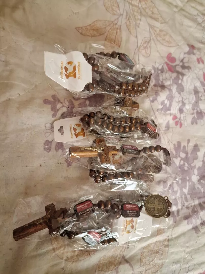 Cliente com o Terço de Contemplação dos Mistérios